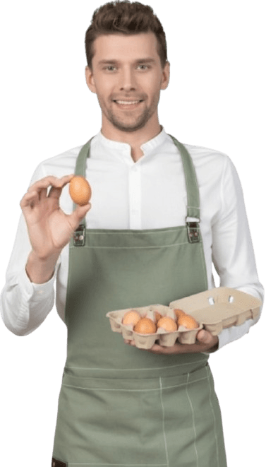 An Egg Masters Lanka team member holding fresh eggs